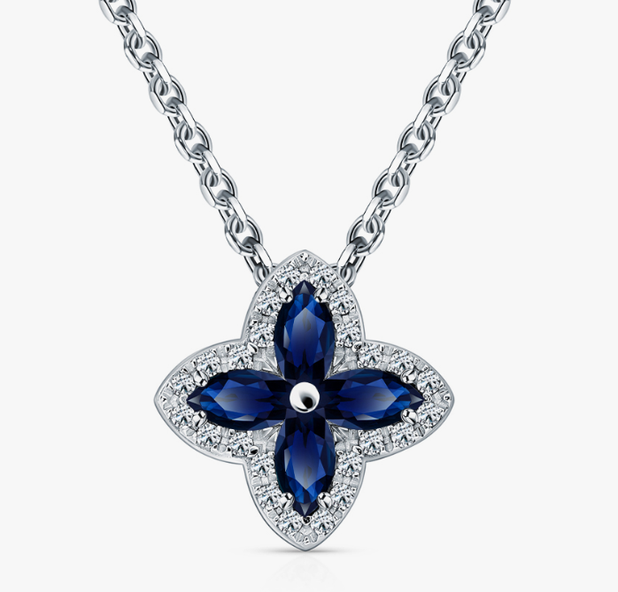 Pendentif en or blanc serti de diamants et de saphirs naturels