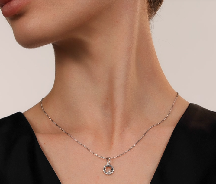 Pendentif en argent orné d'un diamant naturel — 4